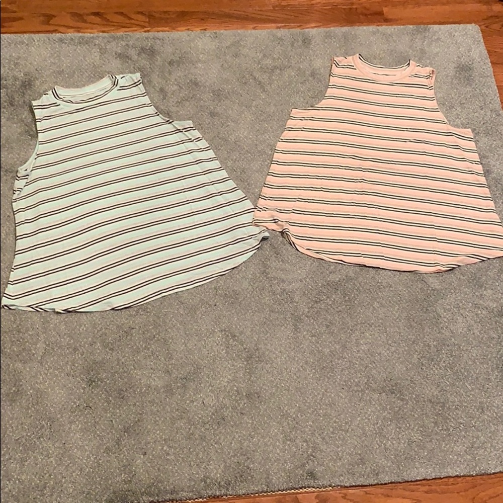 2 Sleeveless Justice Tops